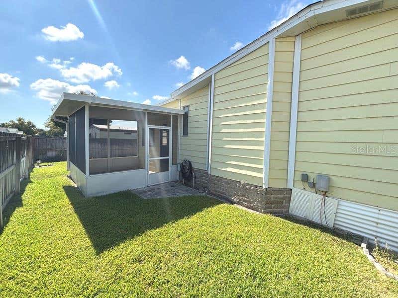 Photo of 719 Fieldstone Avenue, Port Orange, FL 32129 (MLS # V4949974)