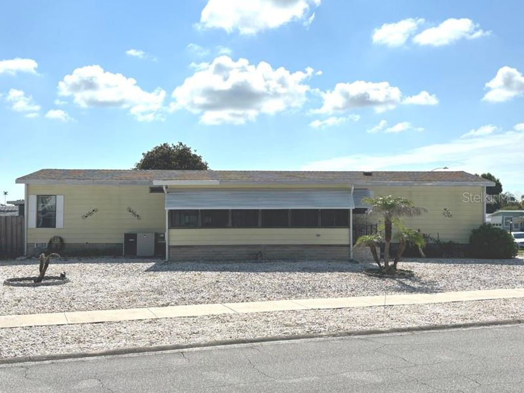 Photo of 719 Fieldstone Avenue, Port Orange, FL 32129 (MLS # V4949974)