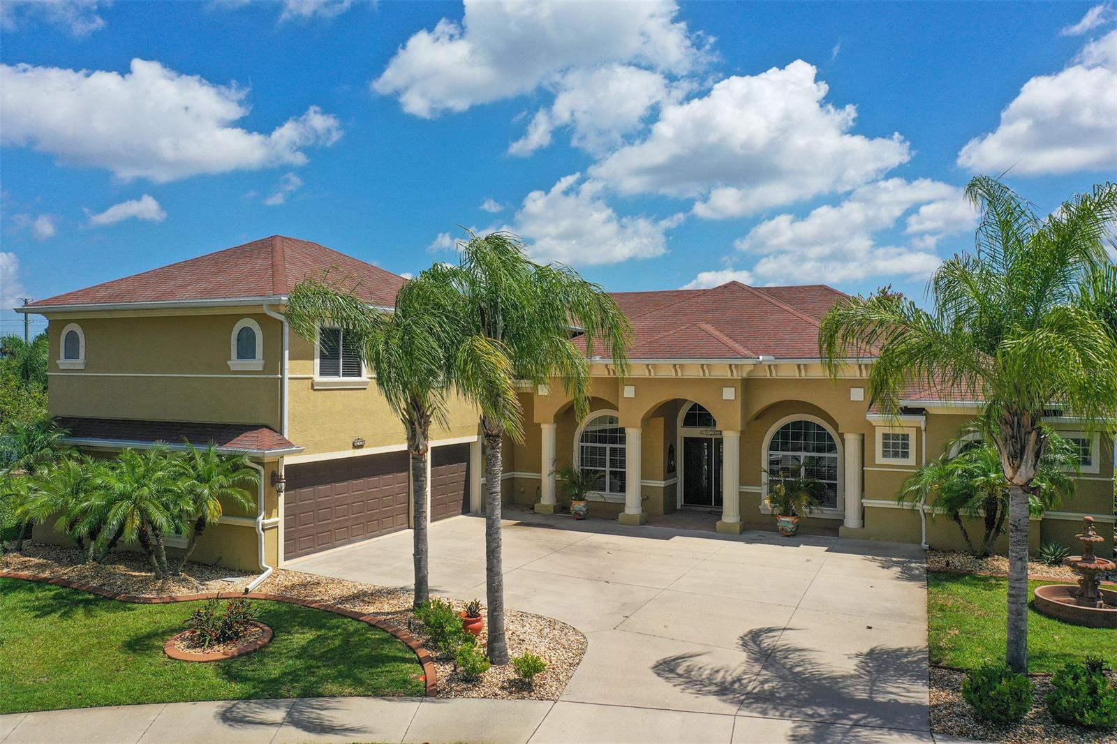 Enjoy your dream home in the community of Promenade Parke, part of the Venetian Bay Town & Country Club Golf Community. This home offers four bedrooms and four full baths. Built in 2009, this Paytas built home is of the highest quality. Features include bonus room, two car garage plus golf cart space. The screened lanai with paved decking and a summer kitchen make this the perfect home for entertaining. Tons of upgrades throughout entire home. All the bedrooms are on the ground level, with the exception of the bonus room (media room) which is the entire upstairs. Enjoy the parlor, breakfast nook, formal dining area, library and separate laundry room. Master suite offers a ''safe room'' which is also a large walk in closet. Double vanities, large walk in shower and garden tub. Two AC units. Open floor plan which is great for entertaining and most of the appliances have been replaced within the last year. Central vacuum throughout home. Home backs up to large pond and is located on a cul-de-sac. Come and enjoy all the amenities this community has to offer, such as, 18-Hole Championship golf course, Beach and Swim Club, join the on-site fitness center or walking and biking on the miles of beautiful trail or dining at the onsite restaurants. Conveniently located about twenty minutes to the beach and is just minutes to SR 44, I-95 and I-4. ;Water: City