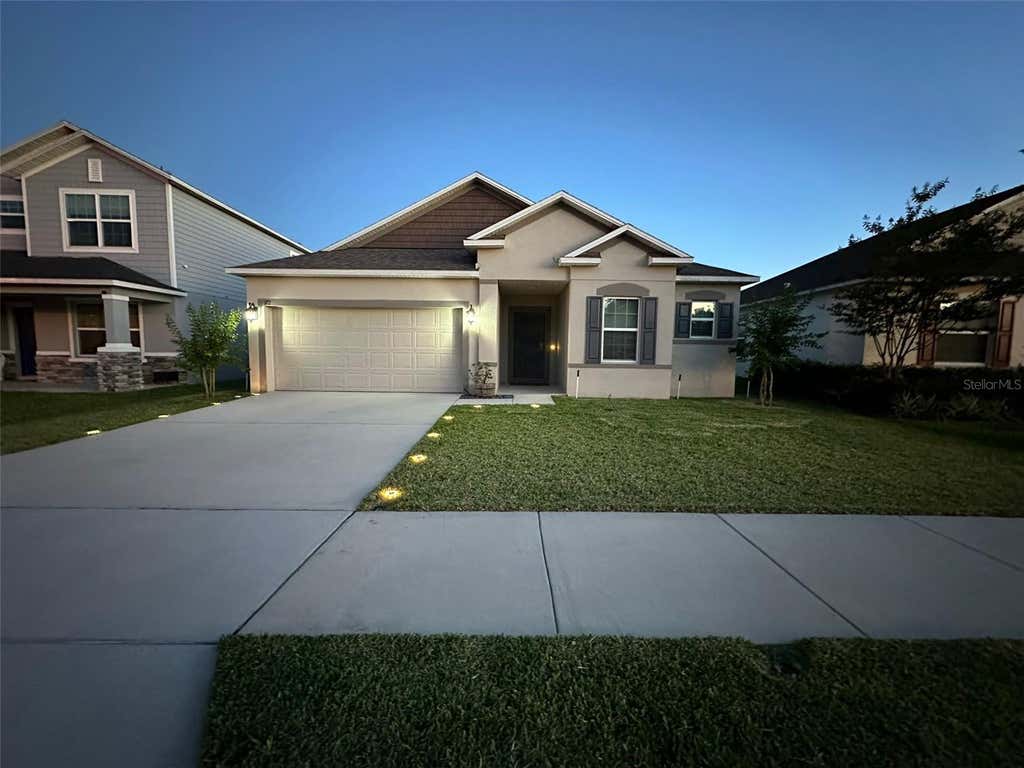 Photo of 172 E Fiesta Key Loop, Deland, FL 32720 (MLS # O6419152)