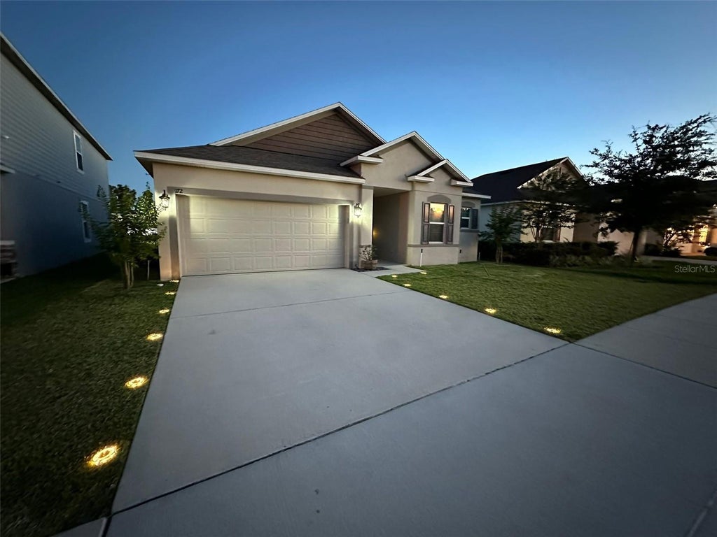 Photo of 172 E Fiesta Key Loop, Deland, FL 32720 (MLS # O6419152)