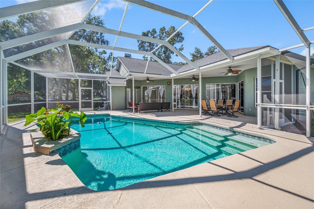 Photo of 1648 Woodridge Court, Lutz, FL 33559 (MLS # TB8559719)