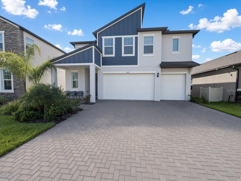 Photo of 18125 Serene Lake Loop, Lutz, FL 33548 (MLS # TB8559129)