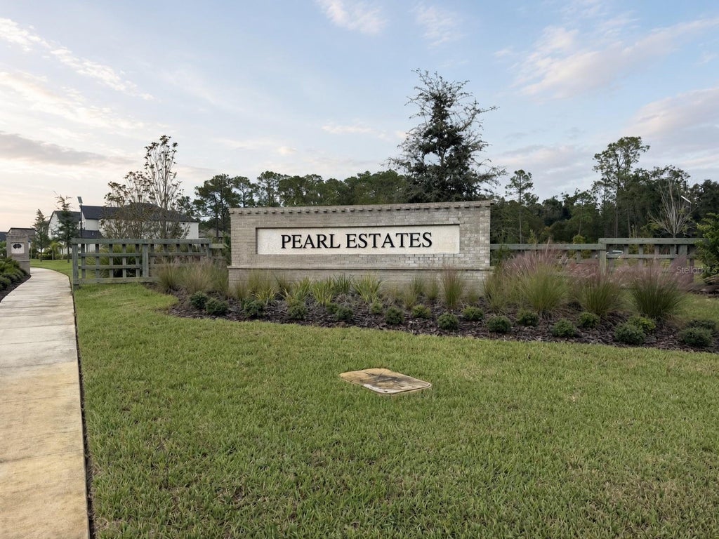 Photo of 18125 Serene Lake Loop, Lutz, FL 33548 (MLS # TB8559129)