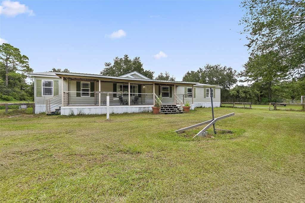 Photo of 2055 County Road 75, Bunnell, FL 32110 (MLS # FC320719)