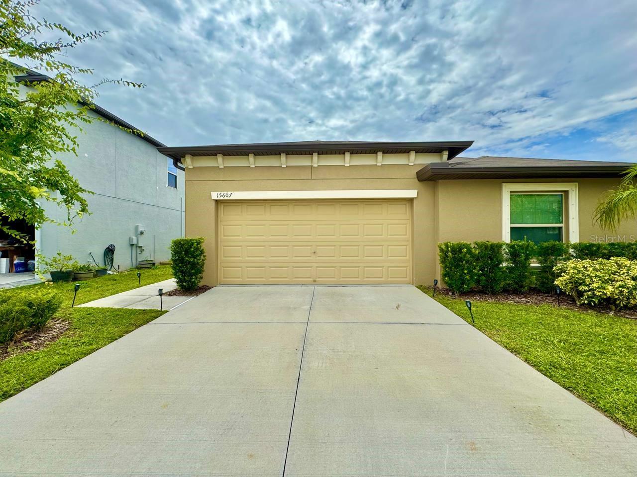 This spacious 4-bedroom, 2-bathroom home with a 2-car garage is located in the peaceful community of Sun City Center. The home features an open floor plan with laminate wood and tile flooring throughout, making it easy to maintain and great for everyday living. The kitchen comes with stainless steel appliances, granite countertops, plenty of cabinet space, and a large island—great for cooking and gathering. The primary bedroom includes a walk-in closet, dual sinks, and a walk-in shower. The fenced-in backyard overlooks a beautiful lake—perfect for relaxing or spending time with friends and family. Community amenities include a pool, fitness center, clubhouse, tennis courts, and playgrounds. This home offers a comfortable lifestyle in a great location. This home is tenant occupied until 9/13/25.