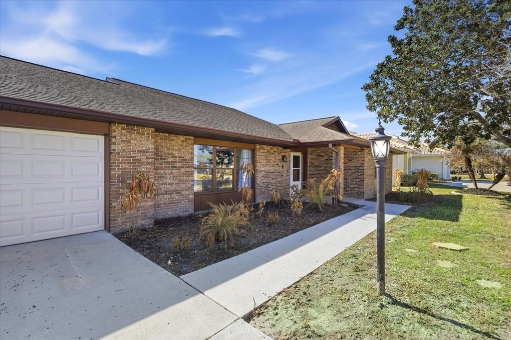 Photo of 10 Flametree Court, Palm Coast, FL 32137 (MLS # FC316438)