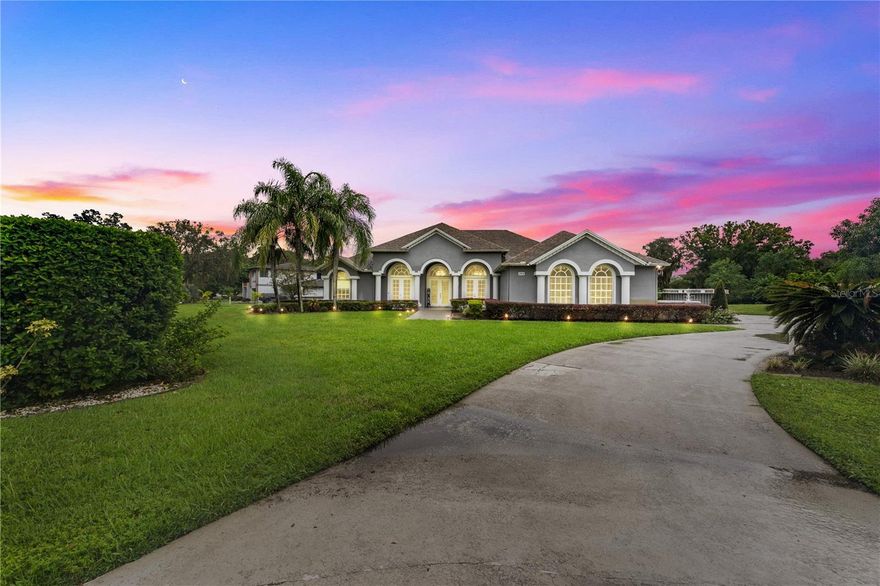 A full acre of land in one of Florida’s most desired zip codes sets the stage for this fully renovated 5-bedroom, 4-bath residence that blends elegance with modern design. From its spacious interiors to the seamless flow outdoors, every detail has been thoughtfully crafted. The highlight is your private retreat: a heated pool with ambient lighting and a complete screen enclosure for privacy and year-round enjoyment. Offering space, style, and distinction, this property delivers the perfect balance of comfort and sophistication in a truly remarkable setting.