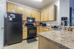 10205 COURTNEY PALMS BOULEVARD 304