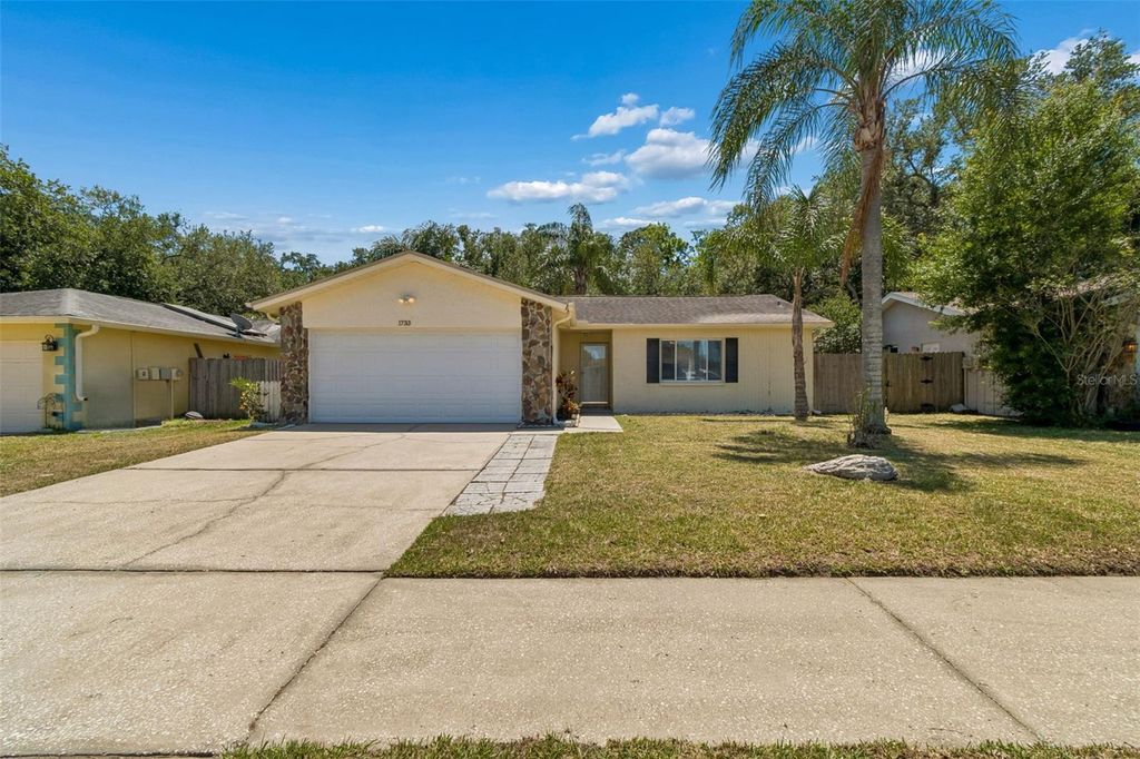 Photo of 1733 Sutton Place, Dunedin, FL 34698 (MLS # TB8502295)