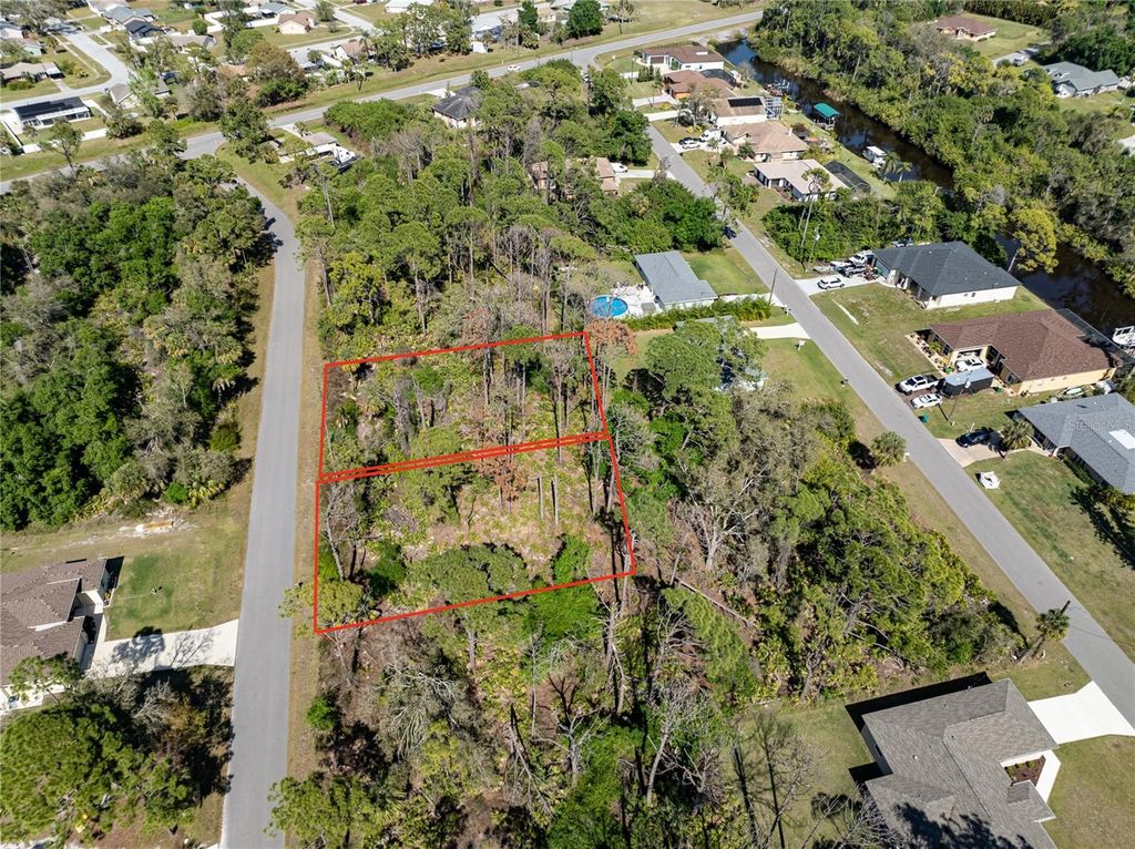 Photo of 48 Saluda Terrace, Port Charlotte, FL 33953 (MLS # N6132295)