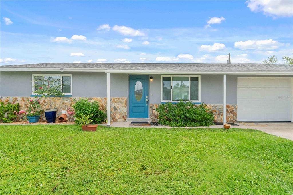 Photo of 361 E Tarpon Boulevard NW, Port Charlotte, FL 33952 (MLS # C7531578)