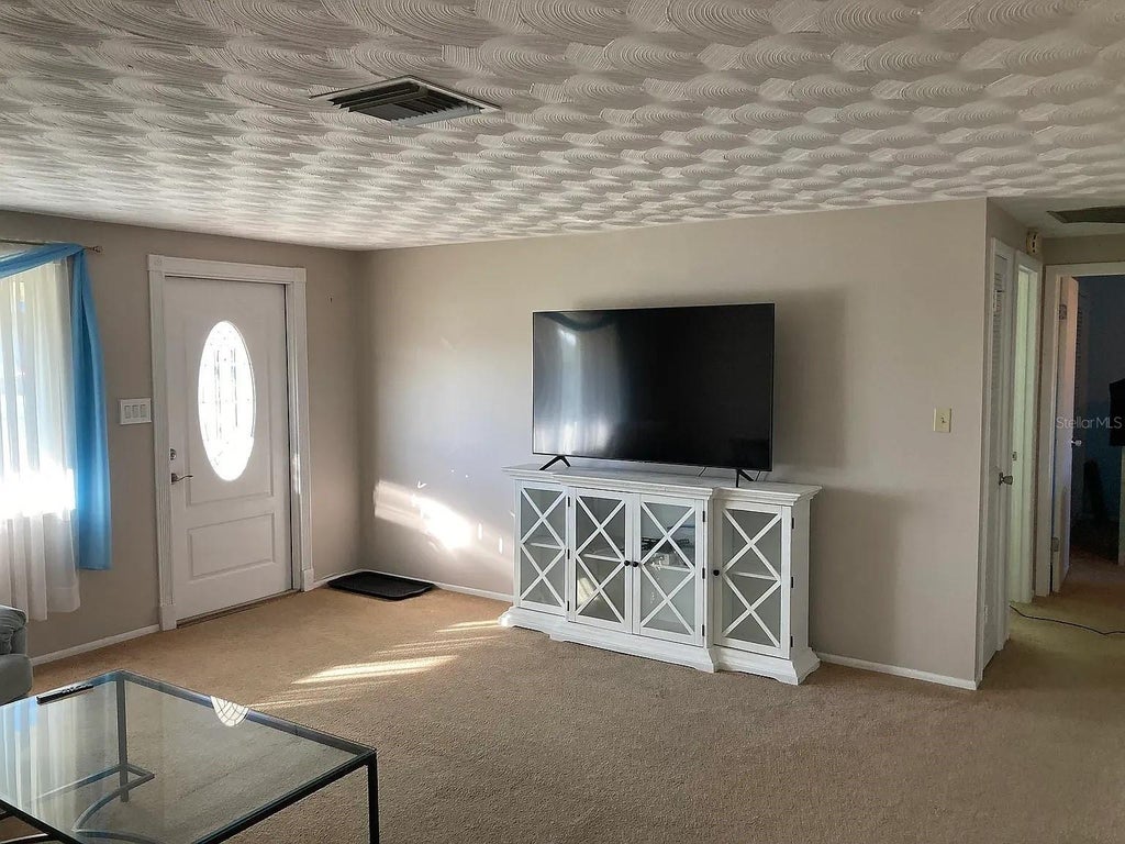 Photo of 361 E Tarpon Boulevard NW, Port Charlotte, FL 33952 (MLS # C7531578)