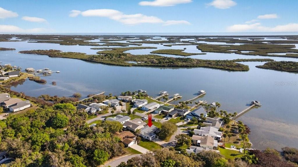 Photo of 332 Marsh Landing Loop, Oak Hill, FL 32759 (MLS # NS1087820)