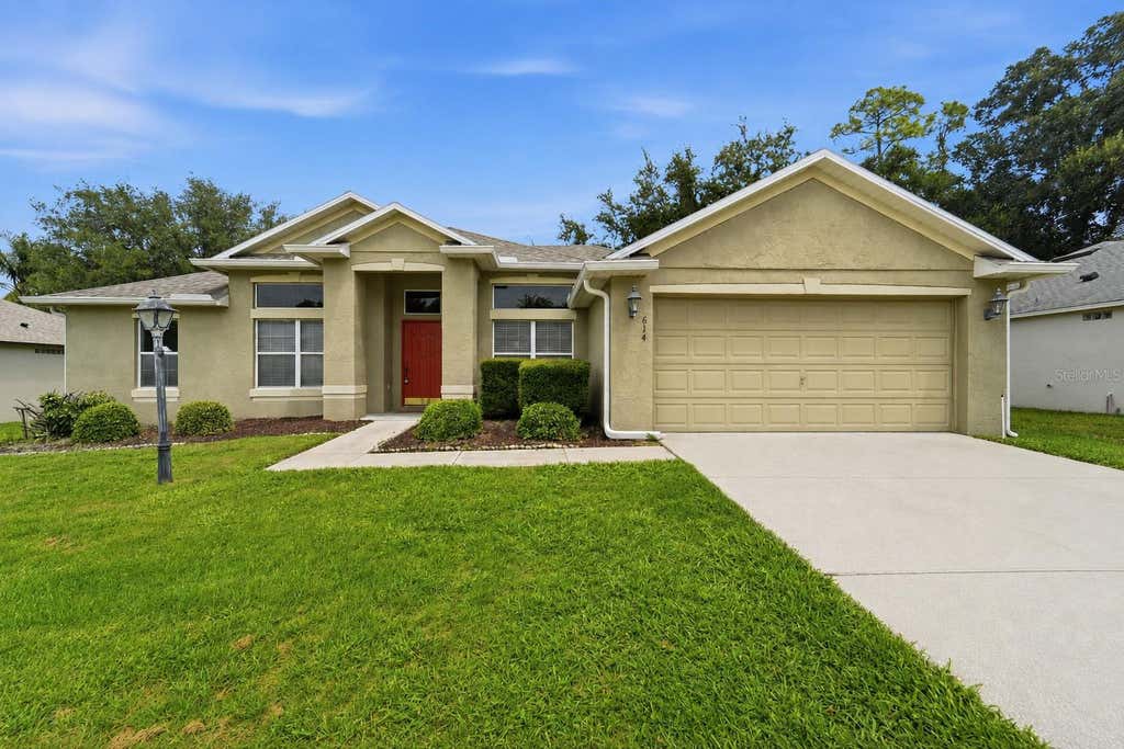 Photo of 614 Red Mulberry Drive, Deltona, FL 32725 (MLS # V4950753)