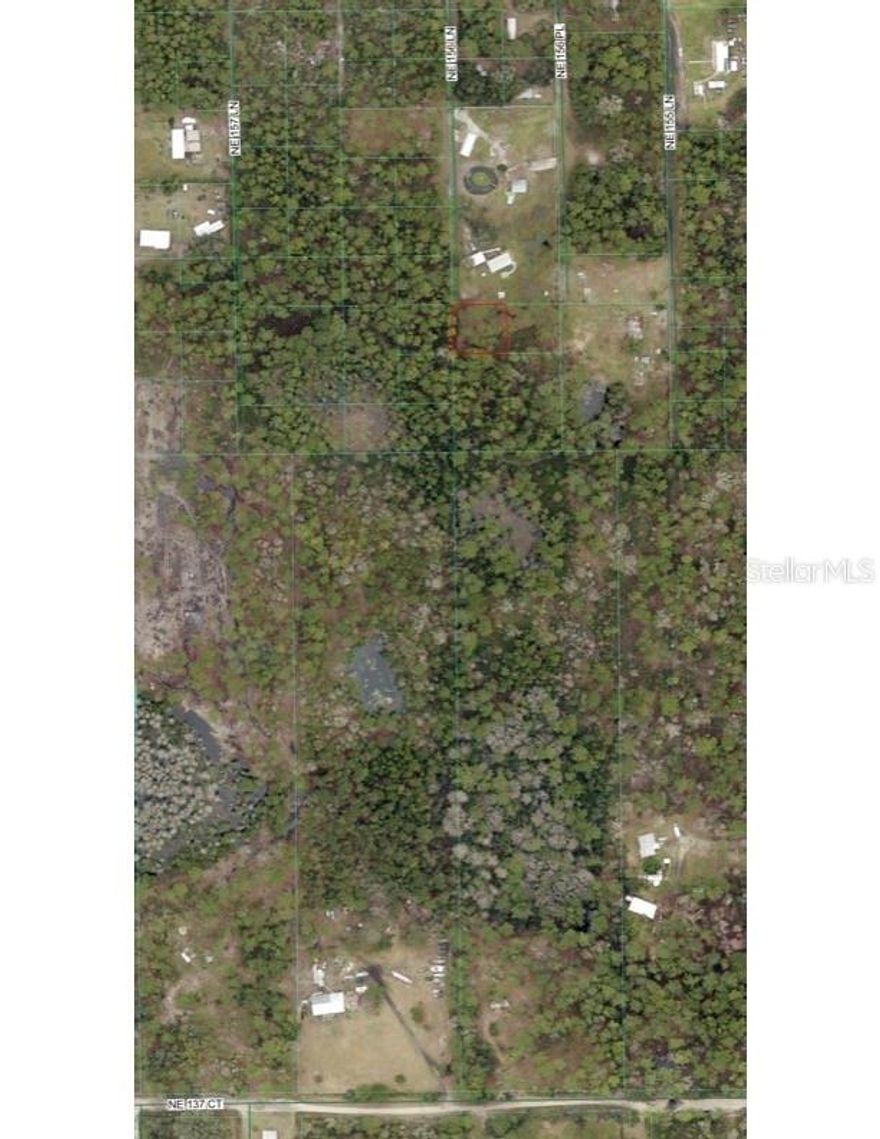.25 Acres located in Mill Creek Campsites subdivision. Lot is located on lime rock/dirt road and is ready for new site built or manufactured home(**NOTE: road does not go all the way to the property and ends at neighboring gate; please do not go on the proeprty without proper maps or app to locate the land**). Located 10 minutes from downtown Fort McCoy with a grocery store, doctor's office, pharmacy, hardware, gas station, pizza, and more. Short drive to Silver Springs which includes Walmart, Lowes, Bealls, Outback and many more of your favorite shopping spots and restaurants. Ocala is only another 10 minutes from Silver Springs with vibrant night life and lots of entertainment options and restaurants. Gainesville(Home of Florida Gators) is only 50 minutes to downtown. If you’re a fisherman, or hunter or simply love hiking, canoeing or kayaking you are in luck! Minutes to Ocklawaha River, Ocala National Forest, and many natural springs(Salt Springs, Silver Glen Springs, Juniper Springs), horseback and walking trails, and off-road vehicle trails await your explorations. One-of-a-kind property and location! Ready for new owners!