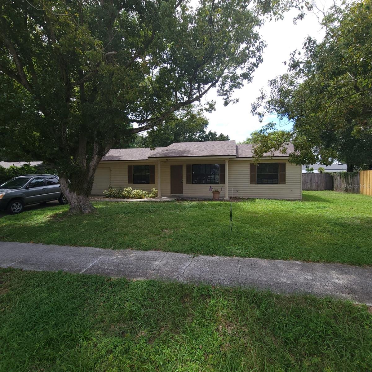 Discover this charming 3-bedroom, 2-bath residence perfectly situated in the heart of Apopka—just steps from top-rated schools, convenient shopping, and a beautiful park right across the street.
This home is move-in ready with a brand-new roof and updated plumbing for peace of mind. The single-car garage comes equipped with a washer and dryer for your convenience.
Step outside to a spacious, fully fenced backyard—ideal for pets, play, and outdoor gatherings. Relax and unwind on the enclosed, screened rear patio, perfect for enjoying warm Florida evenings without the bugs.
Come see it for yourself—you’re sure to fall in love.