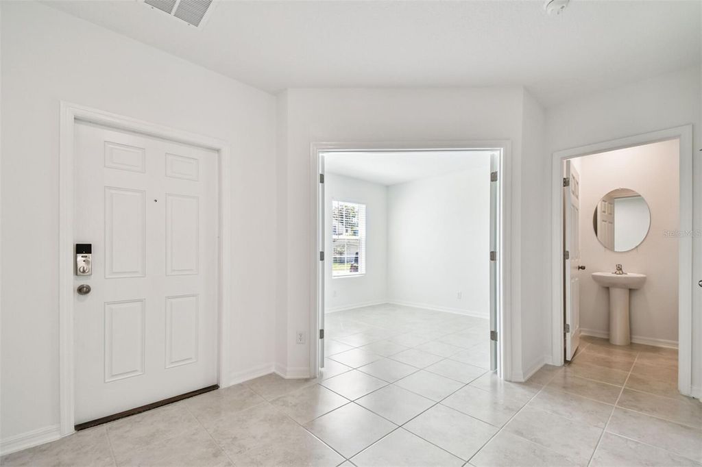 Photo of 12801 Castle Oaks Drive, Hudson, FL 34669 (MLS # TB8396521)