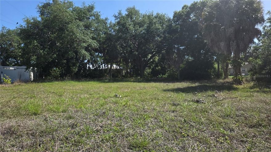 This is the place to be, your piece of paradise is waiting for you.  This Home site consist of 5 lots that can be built on as a whole estate with room for other buildings or divide into 2 oversized home sites.  Short drive or bike ride to the Manasota Beach or South Venice Association Ferry to their beach access and boat ramp.   Looking across the street at a neighborhood park.   Shopping is close by and easy access to I75.