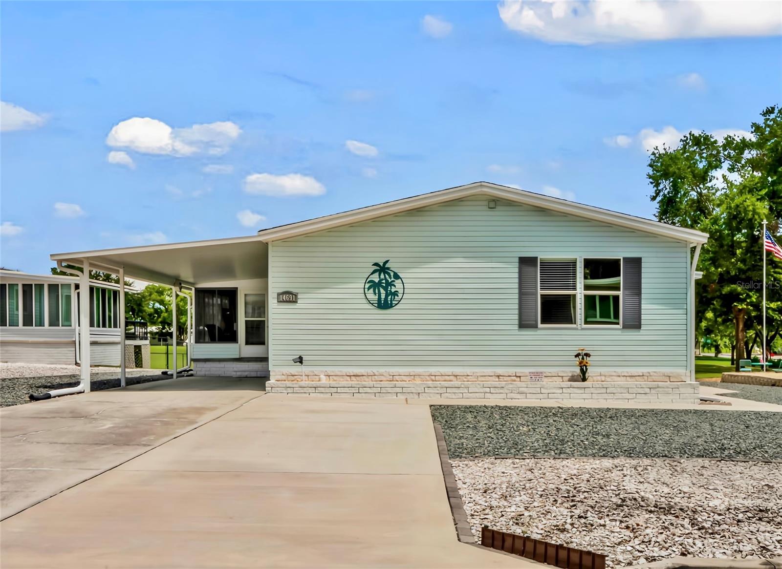Don't miss your opportunity to purchase this beautifully maintained home located in Brookridge, a premier 55+ active adult community. Brookridge offers the Florida lifestyle you’ve been looking for, with a private golf course, tons of recreational amenities, a 24-hour manned security gate, and convenient access to shopping, restaurants, and medical facilities. This spacious 3 bedroom, 2 bath home features a total of 3,188 sq ft under roof and is perfectly situated with golf course views. The home has been thoughtfully updated with a modern kitchen showcasing linen-colored cabinetry, stainless steel appliances, and a stylish backsplash, along with a renovated primary bath featuring dual sinks and ample storage. Enjoy year-round living in the enclosed, air-conditioned Florida room or step out onto the recently expanded (2024) lanai, which overlooks the golf course and includes a swim spa that will remain with the home. This outdoor living space is ideal for relaxing or entertaining while taking in the views. Additional highlights include a large golf cart garage with generous storage, a roof replaced in 2018, HVAC updated in 2021, and a low-maintenance yard with no grass to maintain. Most furnishings are optional, making this property truly turn key and move-in ready. With low HOA fees, this meticulously cared for home combines comfort, convenience, and the best of Florida’s retirement lifestyle. Call today to schedule a private showing!