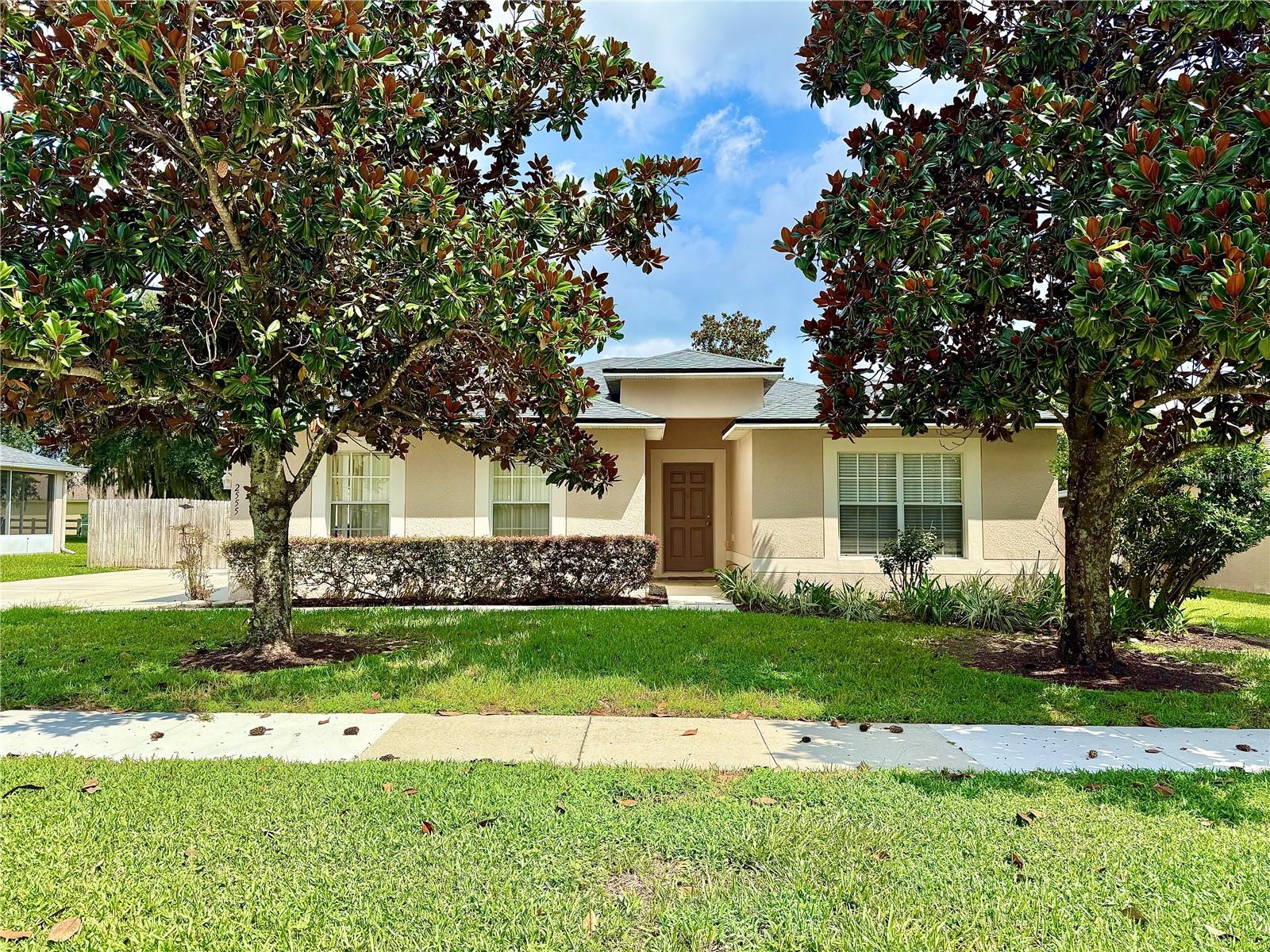This charming Apopka, FL home is situated on a .24-acre lot in the quiet Palmetto Ridge neighborhood, minutes from SR 429. It features a formal living and dining room, an open kitchen-family room layout, a master suite with dual sinks, garden tub, separate shower, and walk-in closet. Highlights include wood laminate flooring, fresh interior paint, new bedroom carpet, built-in plant shelves, and a spacious backyard with privacy fencing and a screened porch. The side-entry garage fits up to six vehicles or a boat. Additional features are a laundry/mudroom, breakfast nook, newer kitchen appliances, and flexible space for an office or nursery. Close to local parks and recreation.