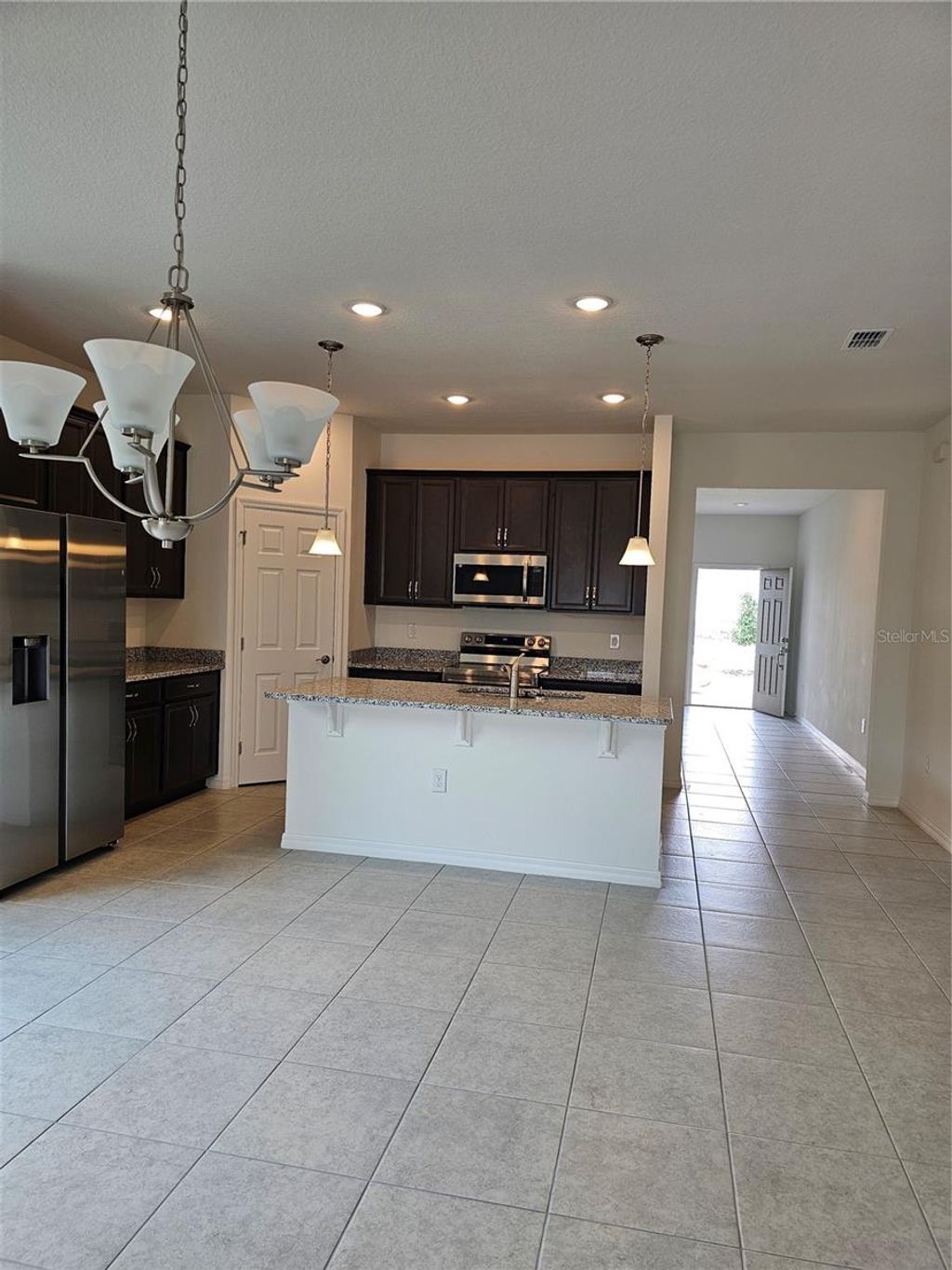 Photo of 1354 Normandy Drive, Haines City, FL 33844 (MLS # S5147706)
