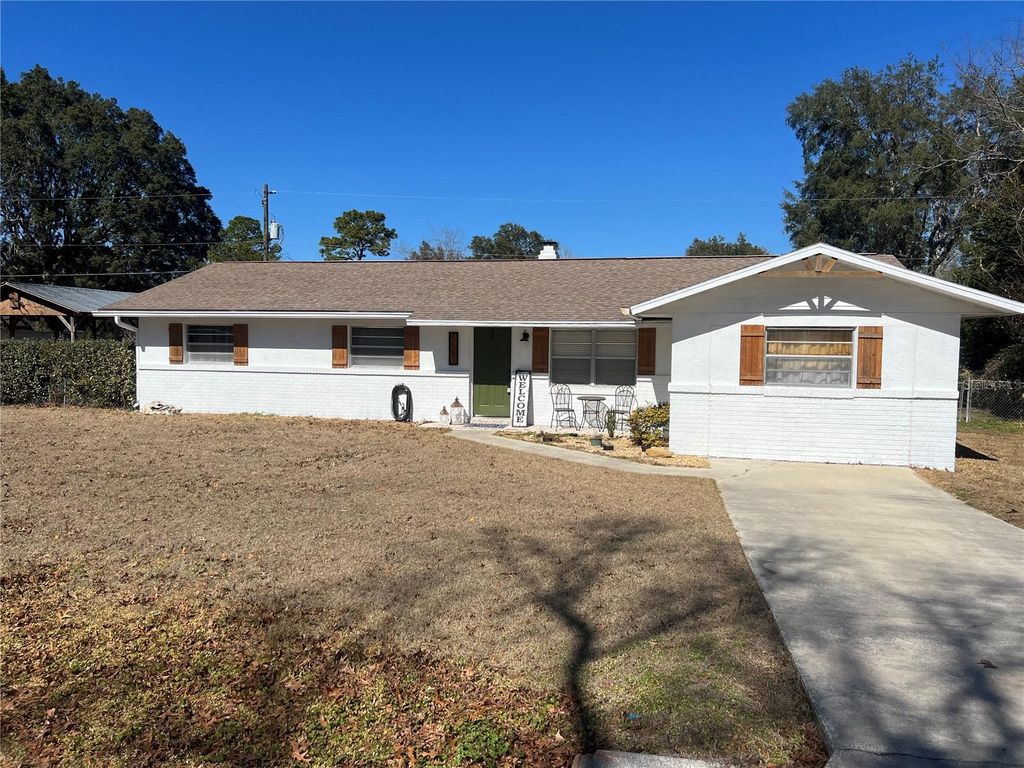 Photo of 5561 NE 5th Place, Ocala, FL 34470 (MLS # OM718756)