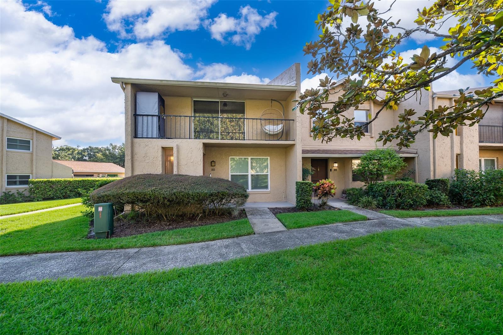 Welcome to this stunning, newly renovated 3-bedroom, 2.5-bath end-unit townhome in the highly sought-after Maitland neighborhood. This home exudes modern elegance with a bright open-concept floor plan, 24x24 designer tile throughout, and abundant natural light. The gourmet kitchen is a chef’s dream featuring white shaker soft-close cabinets, dazzling quartz countertops, a timeless stacked subway tile backsplash, and premium stainless steel appliances. The spa-inspired bathrooms have been fully remodeled to the highest standards, offering a serene retreat for relaxation and rejuvenation. The spacious master suite includes a private balcony overlooking mature landscaping and peaceful garden views. Additional features include a large laundry room with washer and dryer, new light fixtures throughout, and an attached garage for added convenience. Recent updates ensure peace of mind with a new roof (2019), AC (2019), hot water heater (2021), and electrical panel (2023). Outdoor living is enhanced by a private fenced courtyard, perfect for entertaining or enjoying alfresco meals. Ideally located at the end of the building in a quiet, walkable neighborhood, this move-in ready home combines comfort, functionality, and style—ready to welcome you with open arms.