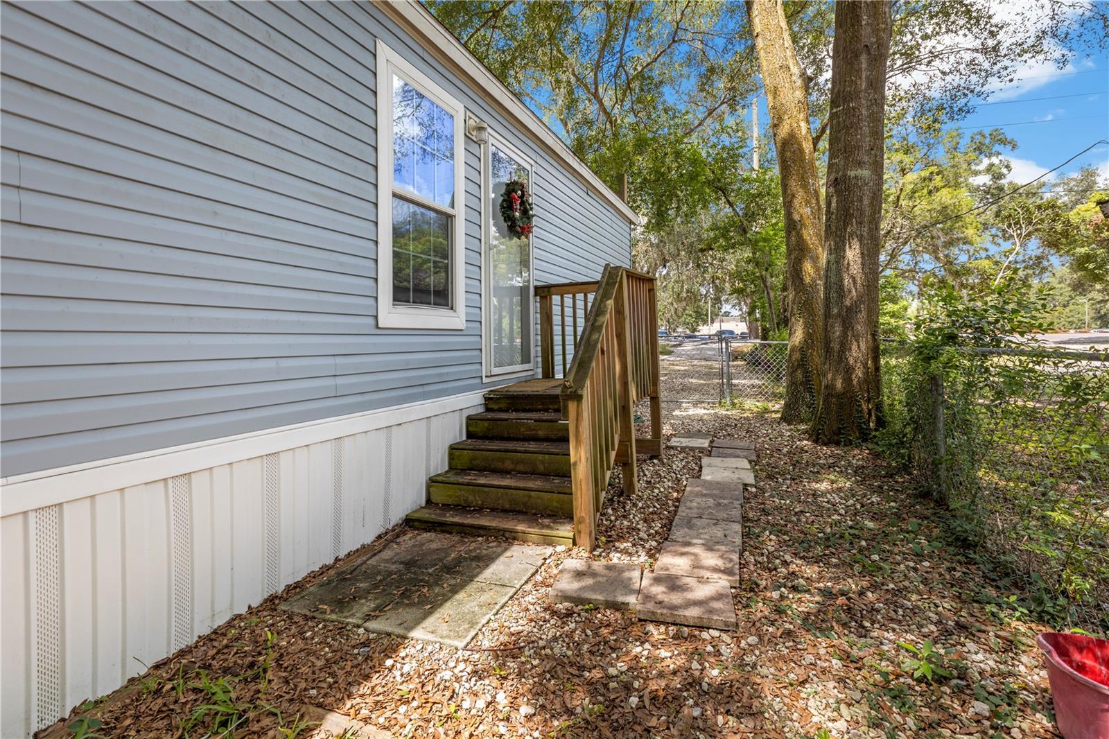 Charming 2021-Built Home on Owned Land in Prime Zephyrhills Location
This well-maintained 2-bedroom, 2-bathroom home offers modern comfort, excellent location, and the benefit of no lot rent. Built in 2021 and situated on owned land, it is tied down and FHA eligible, making it perfect for first-time homebuyers or those seeking a low-maintenance lifestyle.
Inside, you’ll find an inviting open layout with a bright living area and a modern kitchen featuring new countertops, ample cabinet space, and included appliances. Both bedrooms are comfortably sized, and the bathrooms are tastefully finished.
Practical upgrades include a 4-year-old septic system, public water, and a storage shed for extra space. The home’s location is hard to beat, right across from Zephyrhills High School and just minutes from Gall Boulevard, parks, schools, restaurants, and shopping.
Enjoy the best of small-town charm with easy access to Zephyr Park, local dining, and community events. Whether you’re starting out, downsizing, or investing, this move-in-ready property is a smart choice.
Schedule your showing today and see why this Zephyrhills gem is such a rare find.