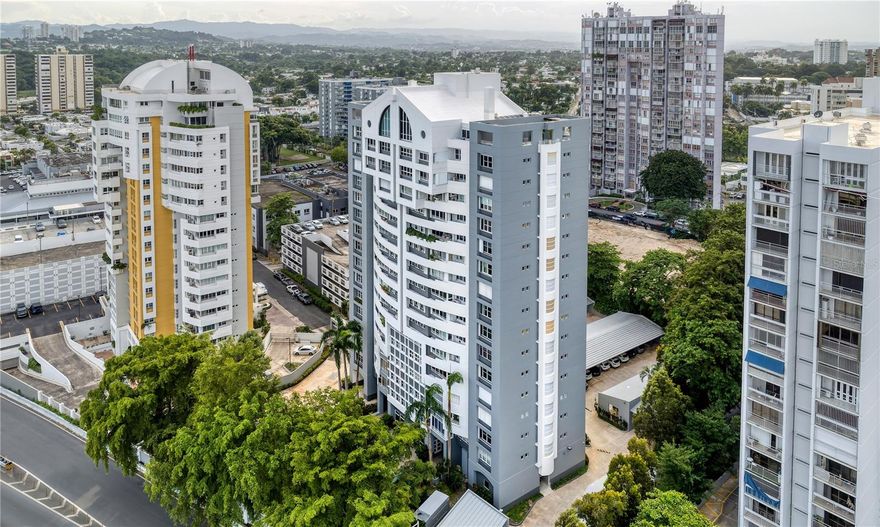 ***SOLD*** Spectacularly designed with captivating custom details, this inviting residence is the epitome of elegance and luxury. Affording a coveted location within a premier condominium in Guaynabo, this duplex penthouse with approx. 5,127 of total Sq. Ft. offers an exceptional metropolitan lifestyle in one of the most renowned communities on the island. The one of a kind home features 5 bedrooms and 4.5 bathrooms, in addition to an impeccably decorated double-height living room, kitchen with breakfast nook, dining room and two family rooms. The oversized primary bedroom suite is accented by an ample walk-in closet and pristine bath with dual vanities. A dedicated laundry room, office and gym are also tastefully distributed throughout the 4,149 Sq. Ft. interior floor plan that is highlighted by curated art pieces, recessed lighting, marble flooring and a warm color palette with alluring dark accents that beautifully contrast against the abundance of invigorating natural light. The expansive rooftop terrace with BBQ area, lush greenery and Asian-inspired decor provides North, West and East exposure views of Guaynabo's enthralling skyline, offering the perfect setting for hosting gatherings that showcase unparalleled city vistas as the enviable backdrop. A storage area and 5 parking spaces round out the rare to market property, adding to its immeasurable appeal. Caparra Classic is an exclusive full-service building with only two units per floor. Top amenities such as 24-hour security, full-power generator, water cistern and visitor parking are provided to residents. Near Baldwin School and multiple shopping venues such as San Patricio Plaza. A short drive away from San Juan, Isla Verde and Dorado. Experience the best Guaynabo has to offer.