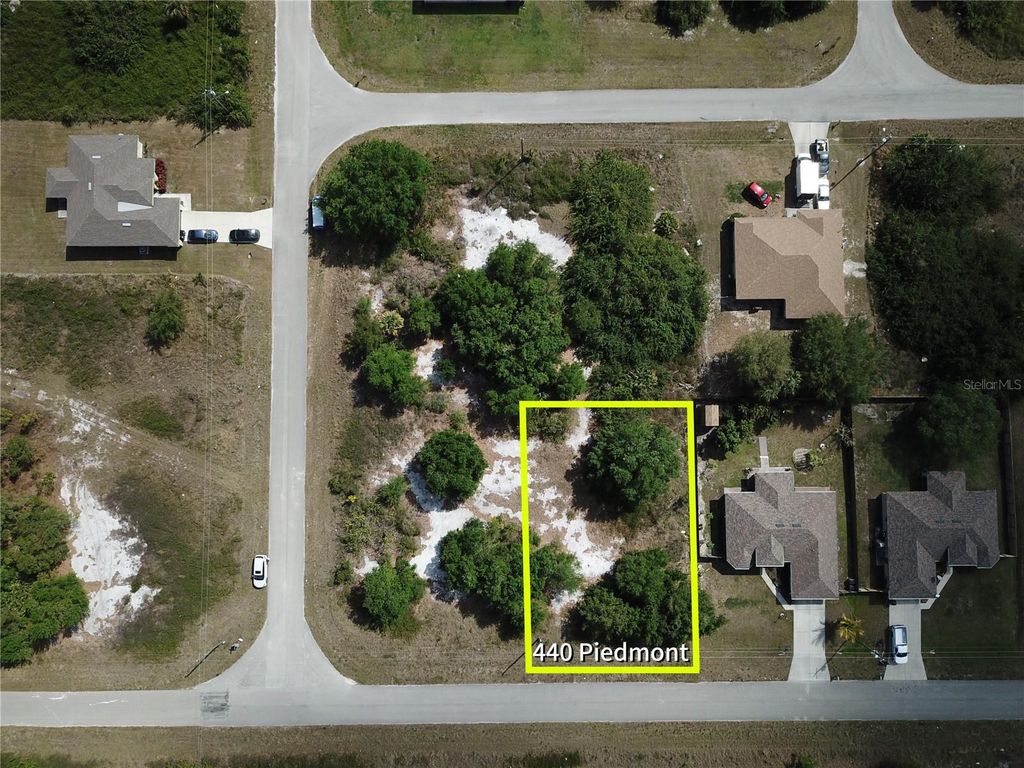 Photo of 440 Piedmont Street, Lehigh Acres, FL 33974 (MLS # O6292502)