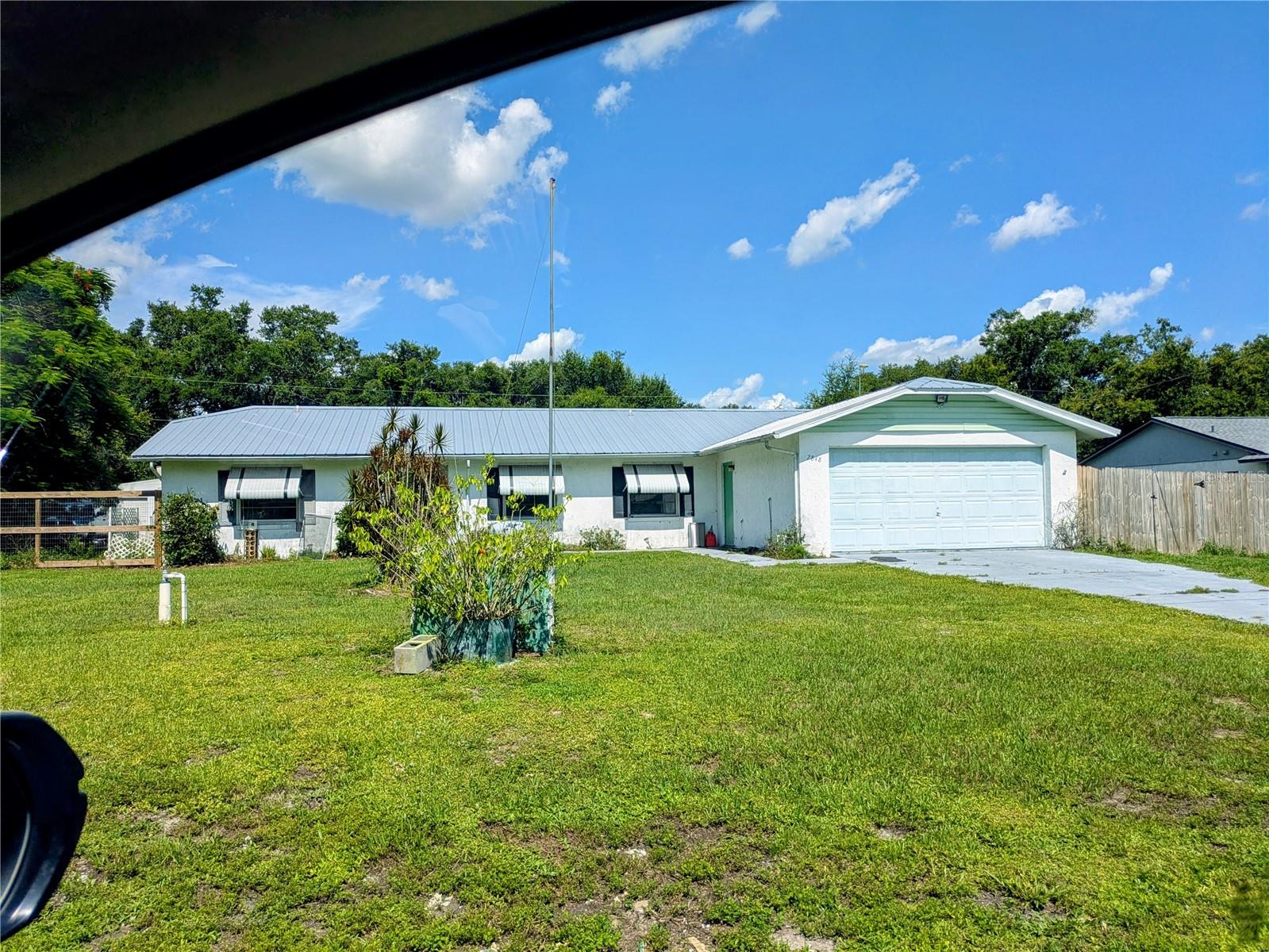 Short Sale. 3BR/2BTH Home, split floor plan design, with pool. This property includes a two car attached garage and a 2 car detached garage, plus an additional storage shed. A new metal roof and the AC installed in 2017.
This property is being sold AS Is, As a Short Sale and Subject to the Lender's Approval.