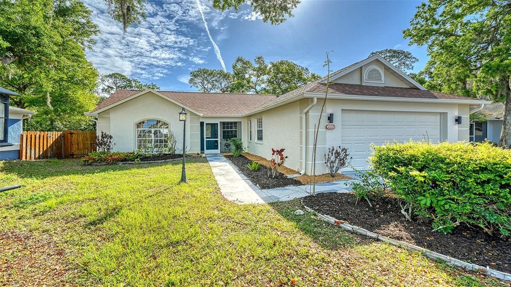 Photo of 4668 Hamlets Grove Drive, Sarasota, FL 34235 (MLS # A4687048)