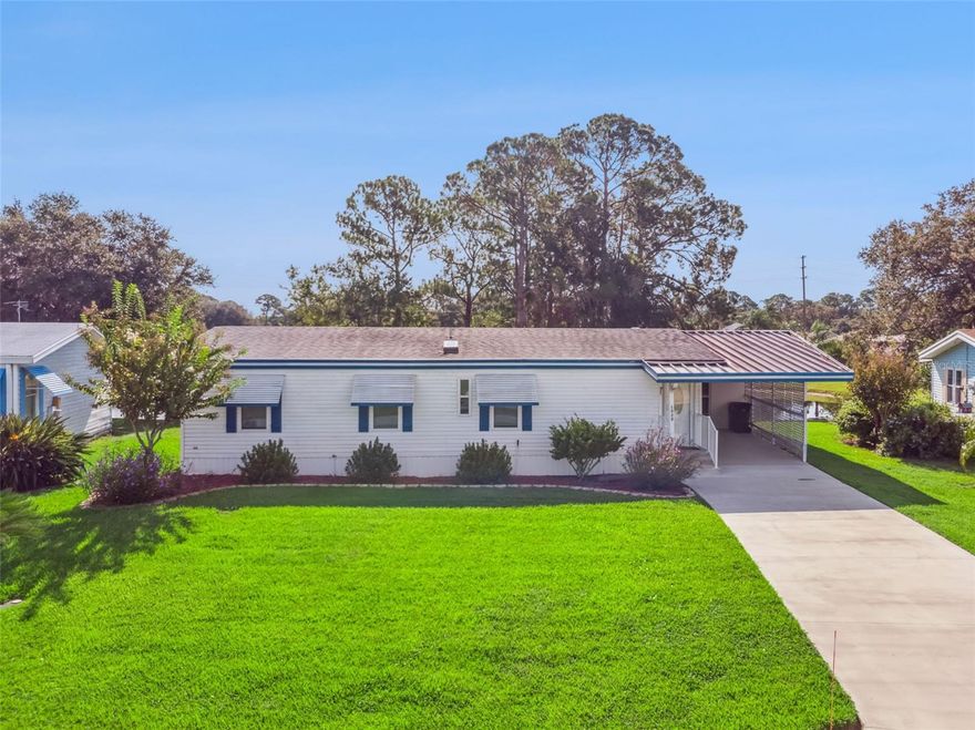 Welcome to this inviting home that combines comfort, functionality, and a prime location. Outside, you will see a well-manicured lawn, a large carport with an additional storage room, and NO REAR NEIGHBORS. As you walk through the front door, the spacious living room, dining room, and kitchen are perfect for any type of gathering. The primary suite has plenty of space for all of your bedroom furnishings. The guest bathroom has been completely updated and has tons of natural light from the skylight. The home is located in the amenity-filled community of Imperial Terrace. It has community access to the stunning Harris Chain of Lakes. Other amenities include a community clubhouse, community pool, community access to the chain of lakes, shuffleboard courts, and more. Some recent updates and selling features of the home include complete re-plumb of the entire house in 2018, new roof and skylights in 2018, luxury vinyl flooring in 2024,  fresh interior paint in 2024, brand new driveway in 2024, double pane windows throughout the entire home in 2021, and the foundation has been recently inspected and resecured to ensure a firm foundation for the next owner of this home!