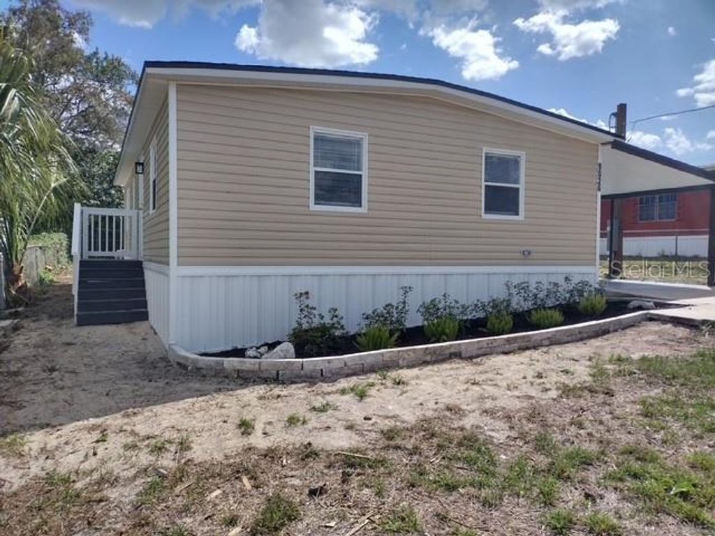 Photo of 9026 Bourbon Street, New Port Richey, FL 34654 (MLS # TB8494041)