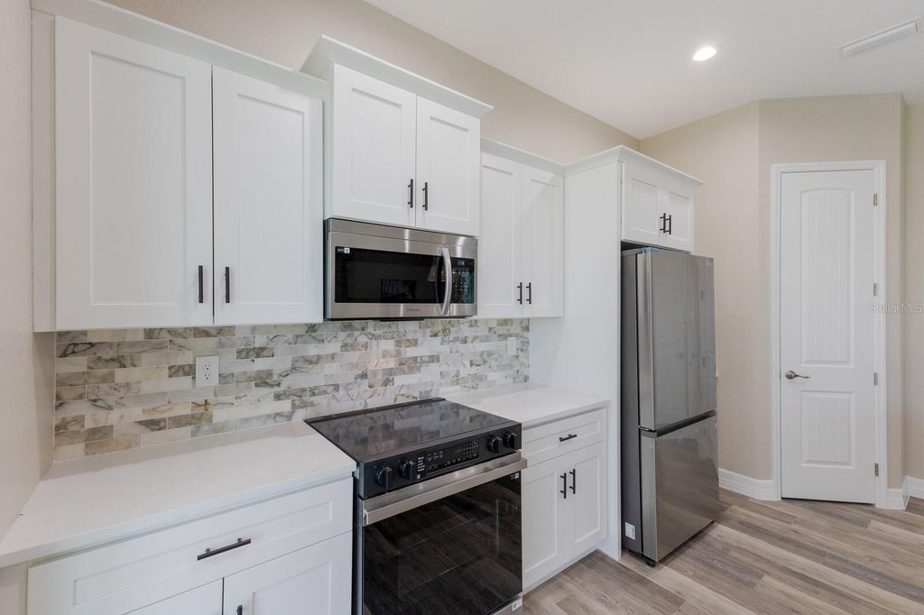Photo of 105 Spur Drive, Rotonda West, FL 33947 (MLS # C7515183)
