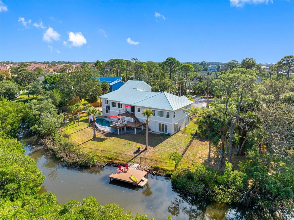 Photo of 1580 Macchesney Drive, Tarpon Springs, FL 34689 (MLS # TB8454389)