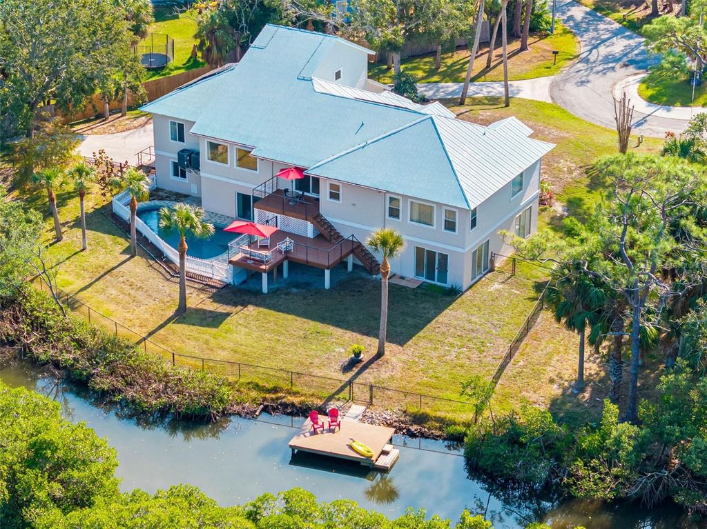 Photo of 1580 Macchesney Drive, Tarpon Springs, FL 34689 (MLS # TB8454389)