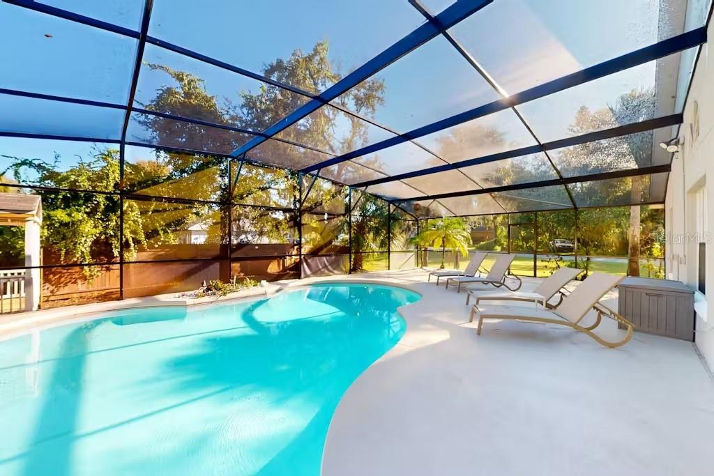Photo of 102 Titan Drive, Davenport, FL 33837 (MLS # O6447310)