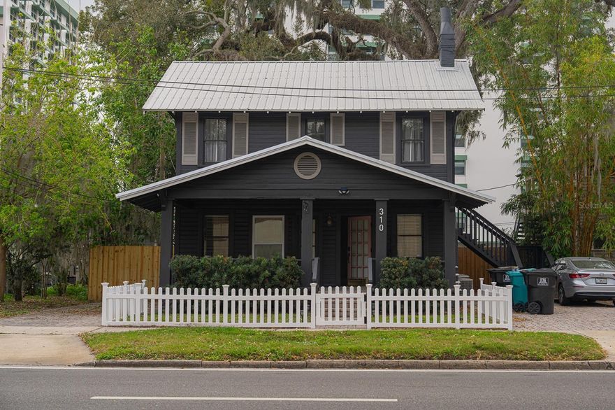 Fully renovated mixed-use duplex offering exceptional flexibility and income potential in the heart of Orlando. This stand-alone historical building is zoned for both commercial and residential use, creating endless opportunities for investors, business owners, or owner-occupants.

Both units are currently operating as successful short-term rentals (Airbnb), generating immediate income.

The downstairs unit, previously configured as an office, features three separate rooms, a kitchenette, dining area, and a full bathroom. It can continue as a short-term rental, professional space, or be converted to residential use.

The upstairs unit includes two bedrooms, one full bathroom, a full kitchen, and an open-concept living and dining area, making it ideal for guests and consistent rental income.

Each unit has its own private entrance and separate electrical meter. The property offers ample parking, accommodating up to seven vehicles total, with dedicated parking areas for each unit. Recent updates include a newer roof (2018). The upstairs unit is equipped with a washer and dryer. Furniture is negotiable.

Ideally located just steps from the Dr. Phillips Center for the Performing Arts, Downtown Orlando, and Lake Eola Park, with easy access to dining, entertainment, and major roadways.

Live in one unit and rent the other, lease both for maximum return, or operate your business while generating additional income this property offers unmatched versatility and income potential.