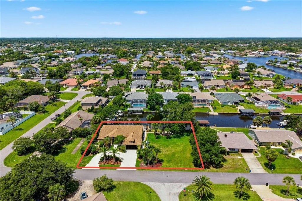 Photo of 25 Cottonwood Court, Palm Coast, FL 32137 (MLS # FC319069)