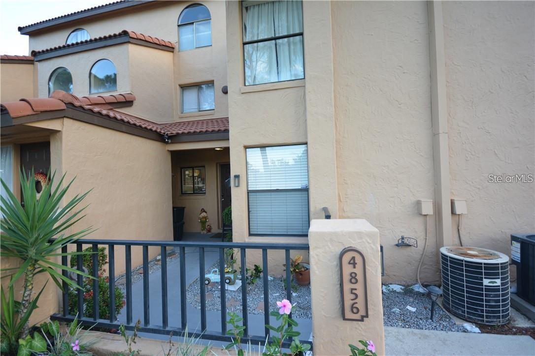 Here we have a great property. Its location is excellent with very easy access to I-4 which can connect you anywhere in Florida quickly and easily. You'll also love all the restaurants, shops, and outlet malls located nearby. This condo has been nicely upgraded with remodeled bathrooms and kitchen. The home features nice custom cabinets, granite countertops, designer light fixtures, and interior paint. The open floor plan is great. The home features tile floors as well. The home features large 3-panel sliders that allow lots of natural light in. This floorplan includes a screened-in back porch overlooking a community green space area. The community pool is large and inviting. Townes of Southgate is a great community that is very well-maintained. The incredible Millenia Mall is located nearby where you'll also find tons of popular stores nearby. Call today to schedule a visit!