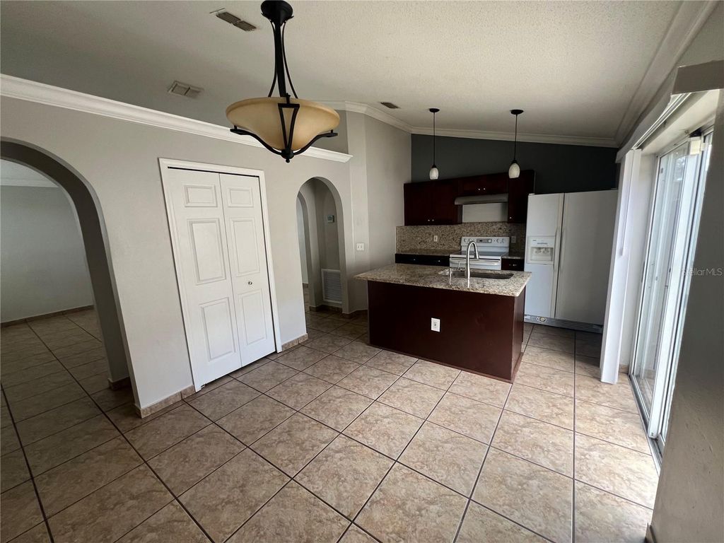 Photo of 13035 Odyssey Lake Way, Orlando, FL 32826 (MLS # O6383813)