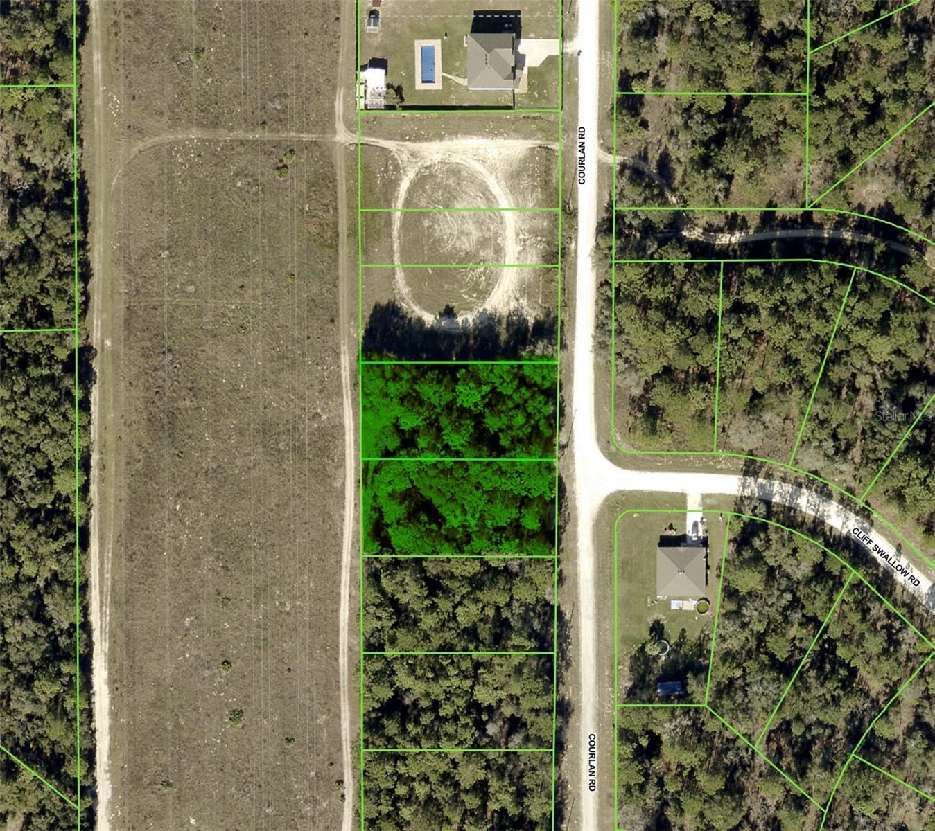 2 two side-by-side high and dry parcels, ready for you to build your perfect home now or later. With no HOA or deed restrictions, you have the freedom to design and create your ideal space. This area is zoned for single-family homes only, mobile homes are not permitted. Enjoy the tranquility of having no neighbors to the rear or north, offering privacy and space. Beautiful live oaks border the two parcels, adding to the privacy and land value. Situated between Homosassa Springs, Chassahowitzka River, and Weeki Wachee Springs, this property is an outdoor lover’s dream. The area is perfect for water enthusiasts and nature lovers alike, with plenty of opportunities for boating, fishing, and hiking. Conveniently located with easy access to US 19 and the Suncoast Parkway, commuting is a breeze, making this the ideal balance of seclusion and convenience. Don’t miss out on this opportunity to create your perfect retreat in a beautiful, natural setting. Contact us today!