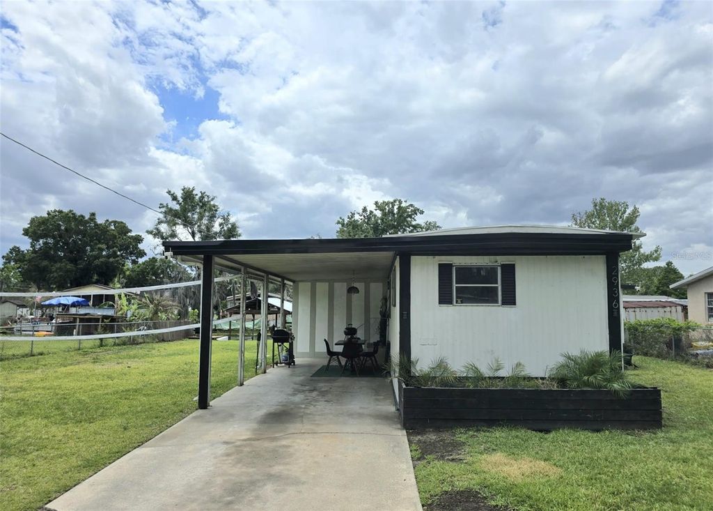 Photo of 2936 N Palm Circle, Haines City, FL 33844 (MLS # P4938480)