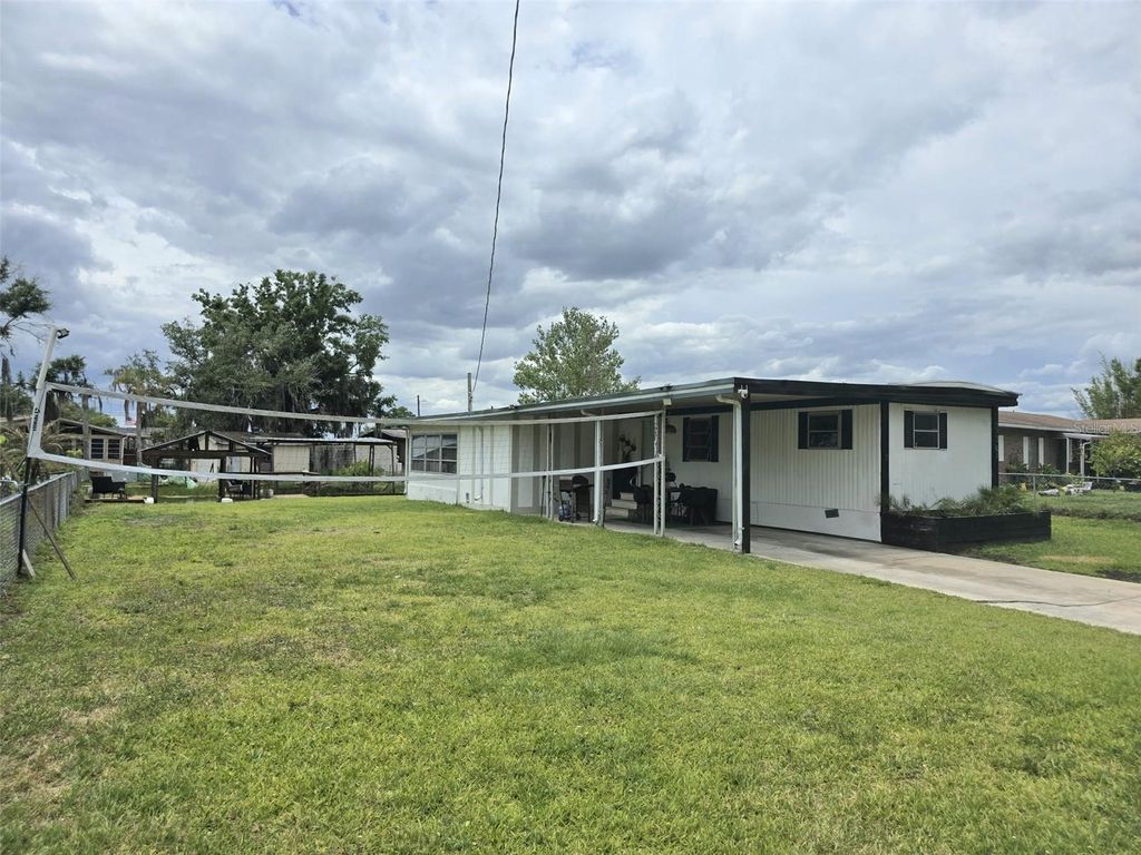 Photo of 2936 N Palm Circle, Haines City, FL 33844 (MLS # P4938480)