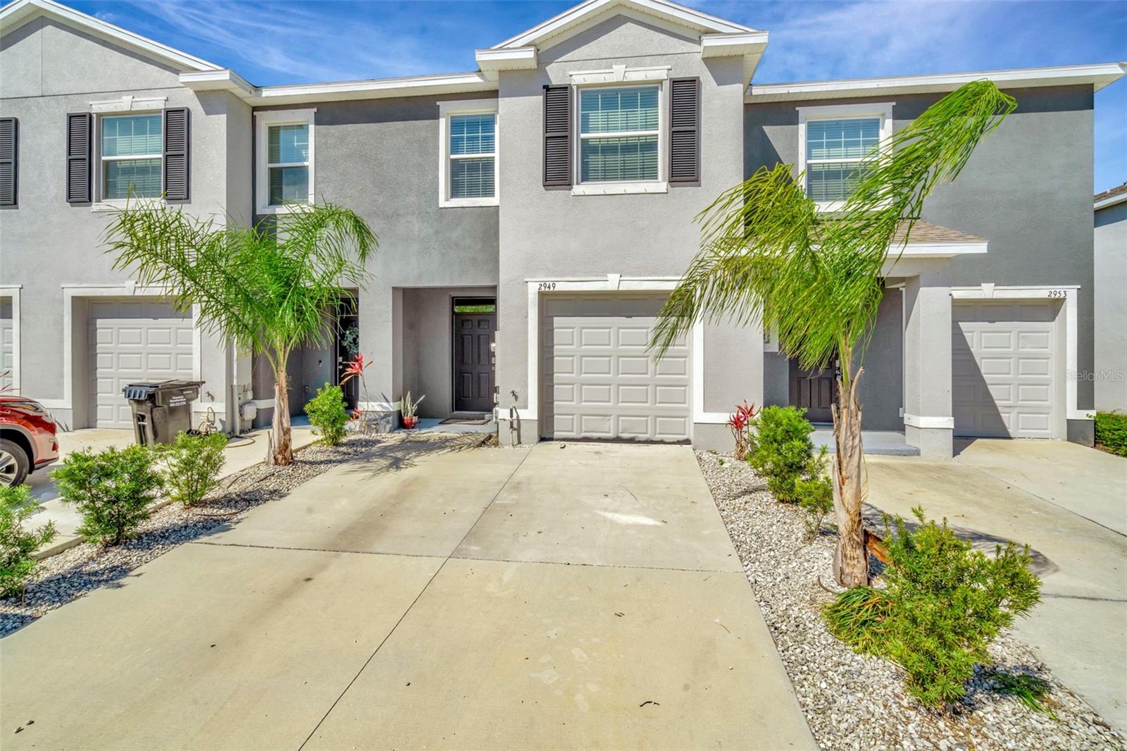 Welcome to this stunning 2022-built townhome in The Preserve, crafted by DR Horton Homes. This modern gem features 3 bedrooms, 2.5 bathrooms, and a 1-car garage, offering the perfect blend of style and practicality in a highly desirable community. As you enter, you'll be greeted by a spacious, open-concept first floor with elegant tile flooring and soaring ceilings. The main living area includes a convenient half bath and flows seamlessly into the dining and kitchen spaces. The kitchen is a highlight, boasting stainless steel appliances, granite countertops, and a central island ideal for meal preparation or entertaining. The adjacent dining area opens up to a bright and inviting living room, with sliding glass doors leading to a large covered lanai, perfect for relaxing or hosting gatherings. Upstairs, the generous second floor includes a wide landing and hallway. The private primary suite features dual closets, including a walk-in, and an en-suite bath with dual sinks, all situated away from the guest bedrooms for added privacy. Just down the hall, you’ll find a laundry closet and a walk-in linen closet. The two guest bedrooms offer plenty of closet space, with one featuring a walk-in closet. Next to the guest bedrooms, there’s an oversized bathroom with a shower/tub combination. The home also includes a spacious 1-car garage. This townhome offers contemporary finishes, ample living space, and a prime location in a vibrant community with fantastic amenities like pools, parks, and trails. Don’t miss the opportunity to make this beautiful home yours!