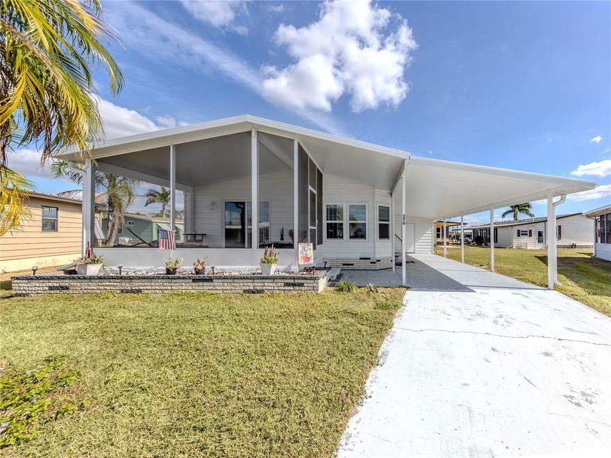 This totally remodeled manufactured home sparkles from top to bottom and is tucked away on a quiet cul-de-sac in the pet-friendly, land-owned Harbor Isles community. Offered furnished, this move-in-ready home makes it easy to start enjoying the Florida lifestyle right away. The bright kitchen features refaced cabinetry, new countertops, and a new range and dishwasher, blending style and function beautifully. Vaulted ceilings, brand-new luxury vinyl flooring throughout, and abundant natural light create an open, airy feel. A lovely new front lanai, located just off the living room, provides the perfect spot to relax and unwind. Major updates include a new roof, windows, and carport, all completed in 2024.
Nestled along the scenic Myakka River, Harbor Isles is a vibrant 55+ community known for its resort-style amenities and welcoming atmosphere. Residents enjoy a marina with direct Gulf access, a private riverfront park, a clubhouse, heated pools, fitness center, pickleball and tennis courts, and a full calendar of social activities and clubs. With its active lifestyle, friendly neighbors, and convenient location close to beaches, shopping, and dining, Harbor Isles is the perfect place to call home.