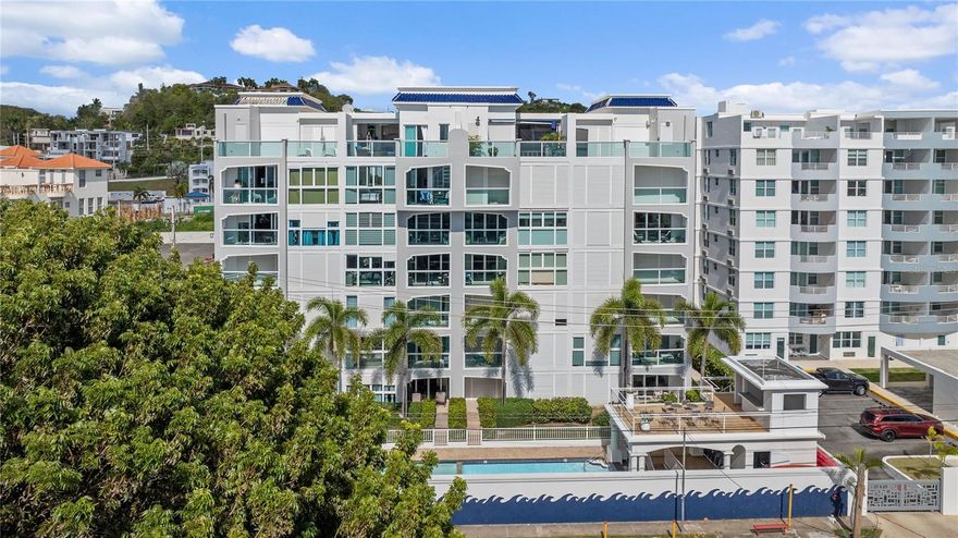 Imagine starting your day with panoramic ocean views and the soothing sound of waves in the distance. Located in beautiful Rincón, this bright and airy condo captures the essence of relaxed coastal living, featuring open interiors filled with natural light and a private balcony perfect for sunset dinners or slow mornings with coffee. The residence offers 2 bedrooms, 2 bathrooms, 2 parking spaces, and approximately 999 square feet of living space, and comes fully furnished with an equipped kitchen, water heater, washer and dryer, storm shutters, a water cistern, and the added benefit of a full power generator. Just steps from the beach and offering stunning ocean views, this property is set within a peaceful community with resort-style amenities and is only minutes from sandy beaches, renowned surf spots, and Rincón’s vibrant dining scene, making it ideal as a personal retreat, full-time residence, or vacation rental investment, with Airbnb allowed.