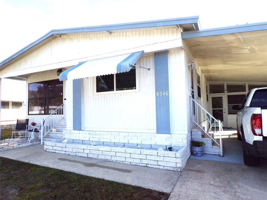 Photo of 6546 Durian Trail, New Port Richey, FL 34653 (MLS # W7881906)